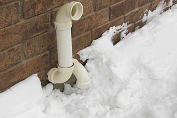 removing snow from furnace vents